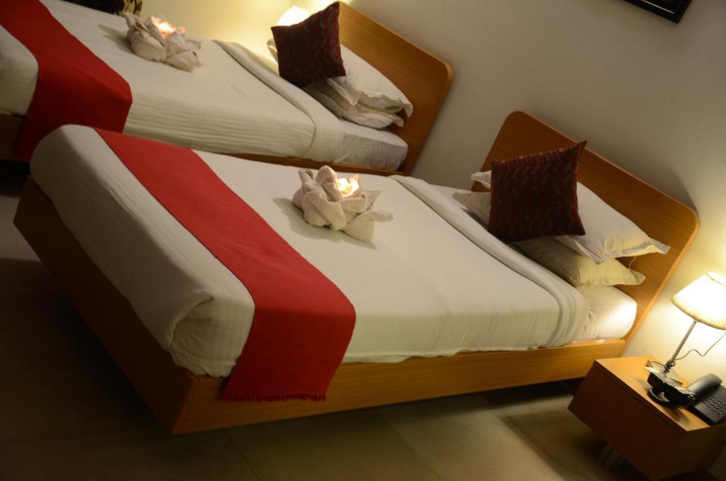 Sunkissed Plaza Hotell Calangute Rom bilde
